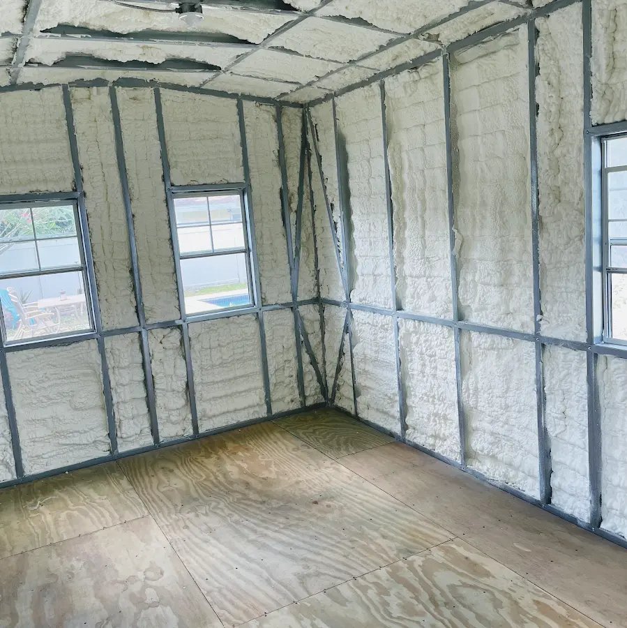 Closed-cell spray foam insulation applied to wall cavities in a residential project in Lake Monticello
